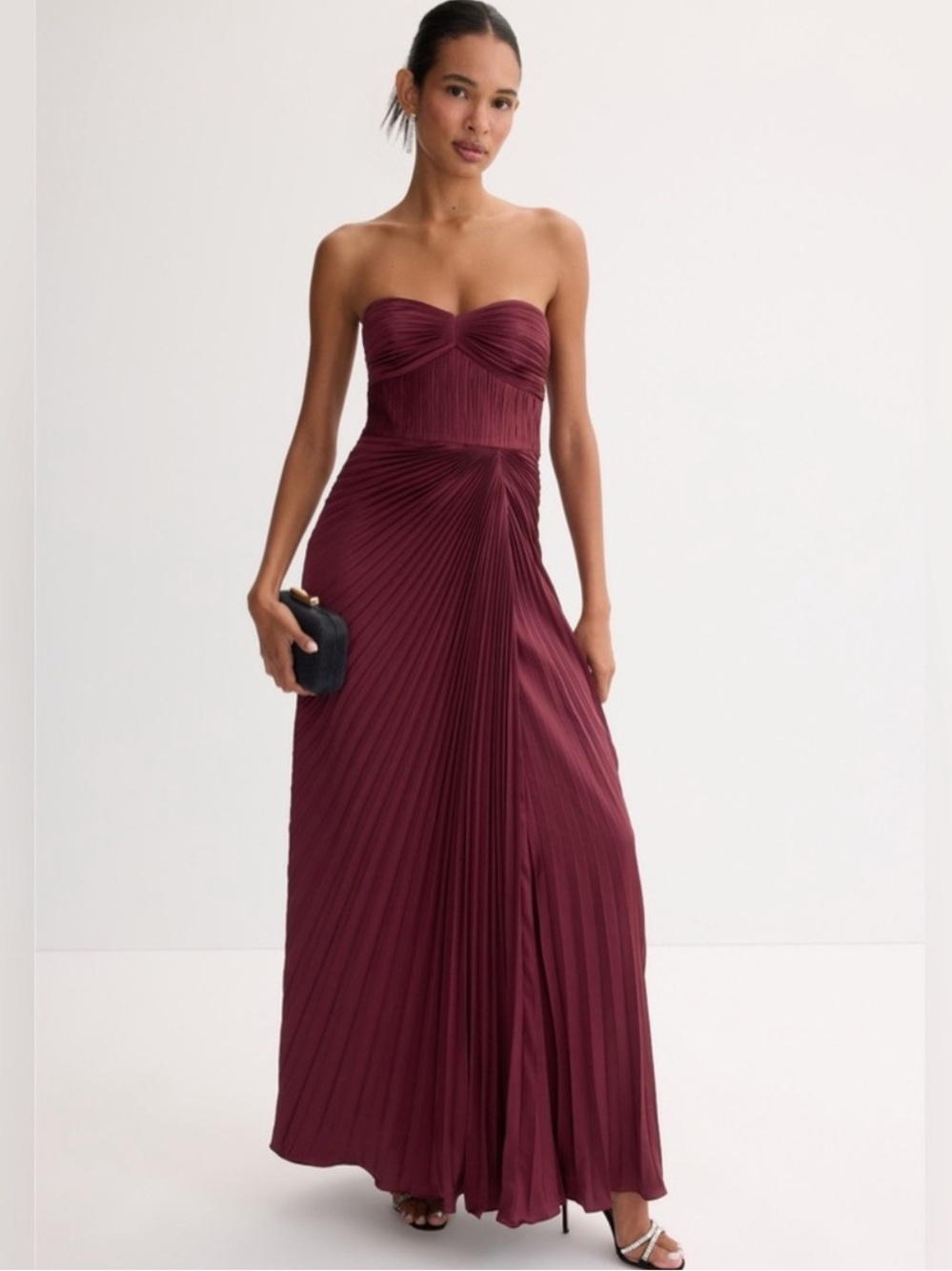 AMUR Joyceanne Sweetheart
Gown Strapless Pleated Gown in Pinot Noir Burgundy